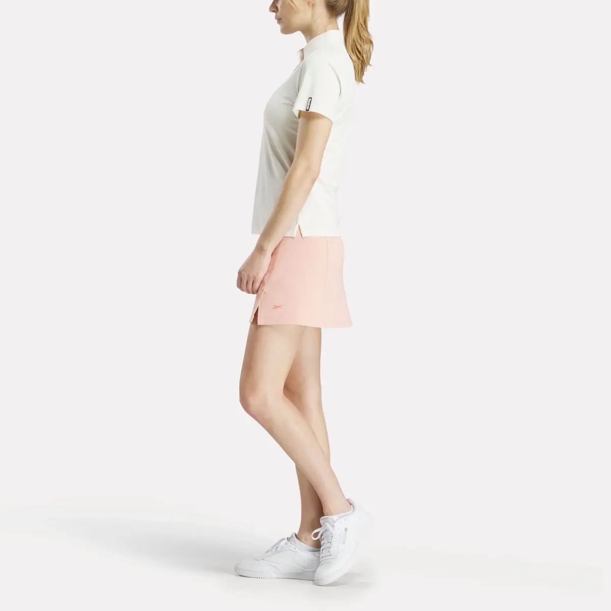 Polo à manches courtes et empiècement en piqué extensible pour femmes Polo à manches courtes et empiècement en piqué extensible pour femmes