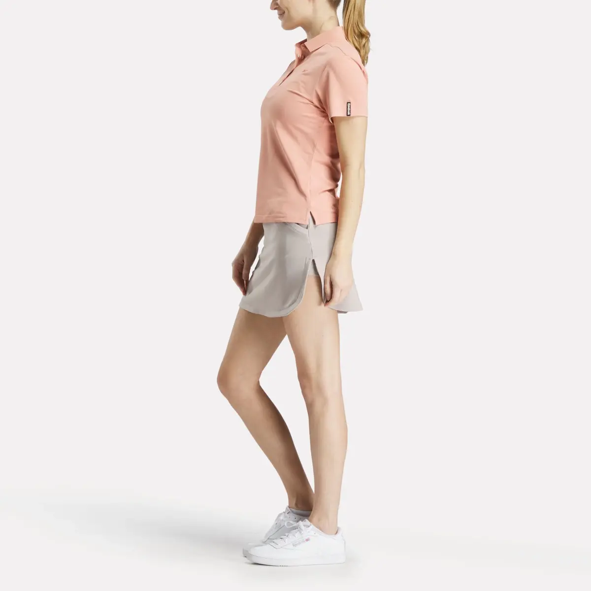 Polo à manches courtes et empiècement en piqué extensible pour femmes Polo à manches courtes et empiècement en piqué extensible pour femmes
