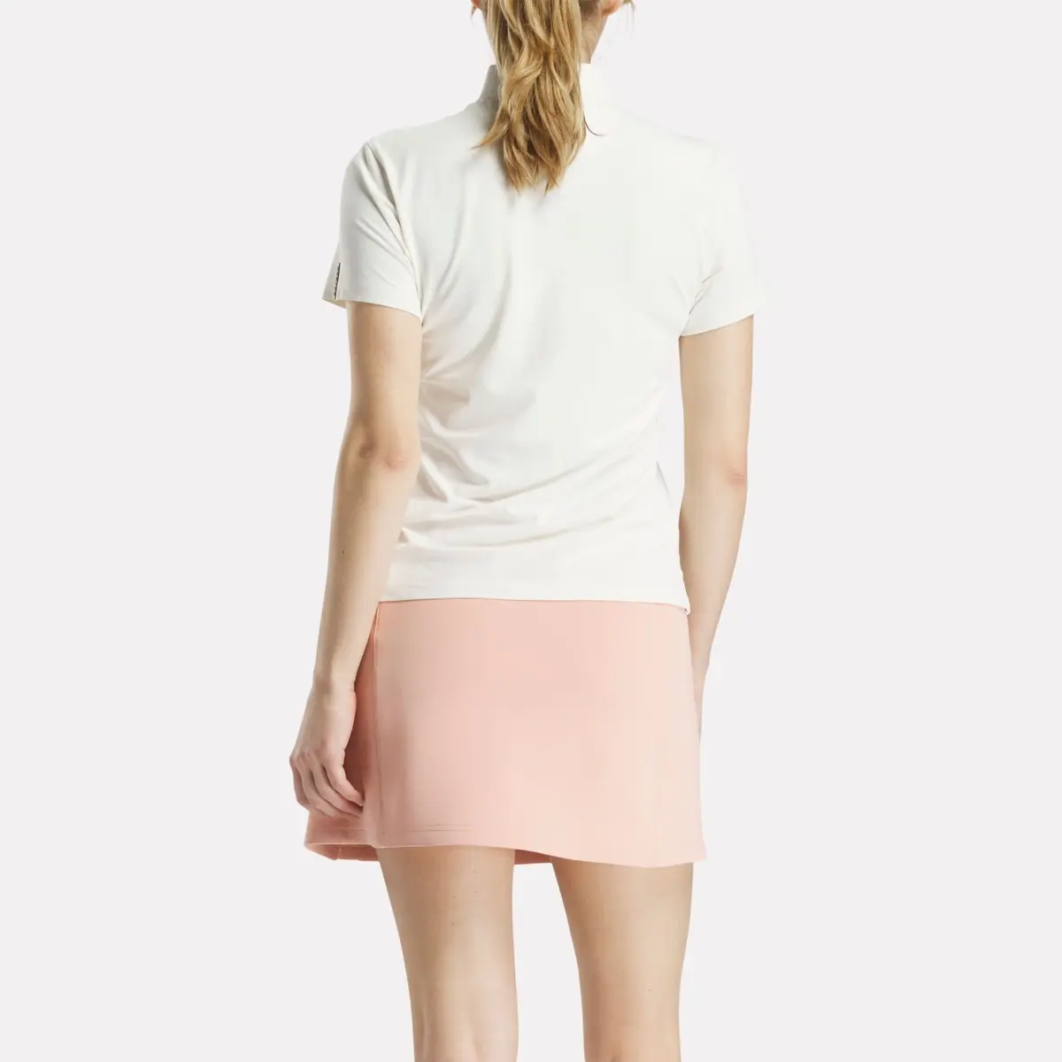 Polo à manches courtes et empiècement en piqué extensible pour femmes Polo à manches courtes et empiècement en piqué extensible pour femmes