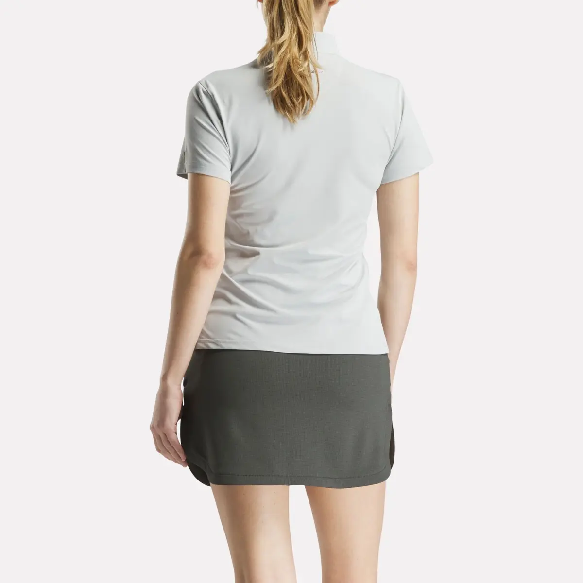 Polo à manches courtes et empiècement en piqué extensible pour femmes Polo à manches courtes et empiècement en piqué extensible pour femmes